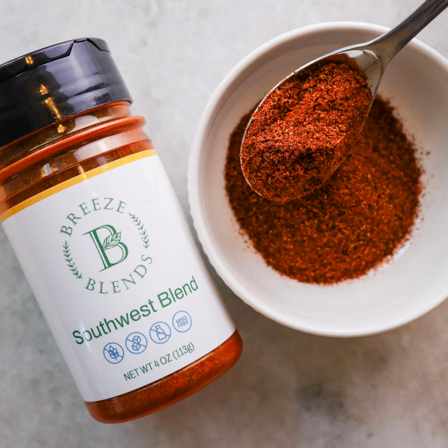 Breeze Blends Southwest Blend Shaker bottle and cup of seasoning with spoon