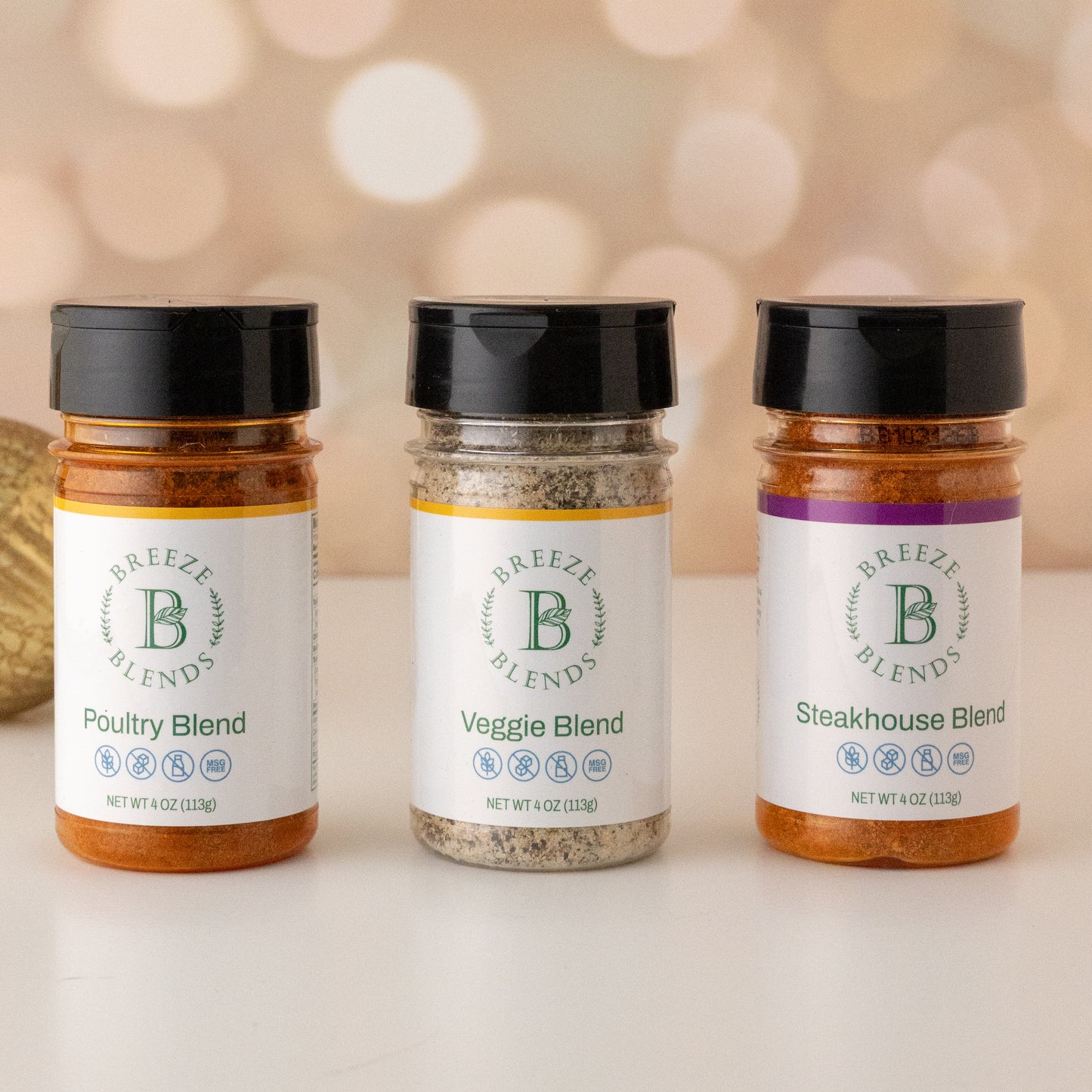 Breeze Blends three bottles of Breeze Blends seasoning blends on a light background