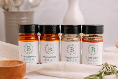 Breeze Blends 4 Pack jars on a kitchen counter with herbs in the background.